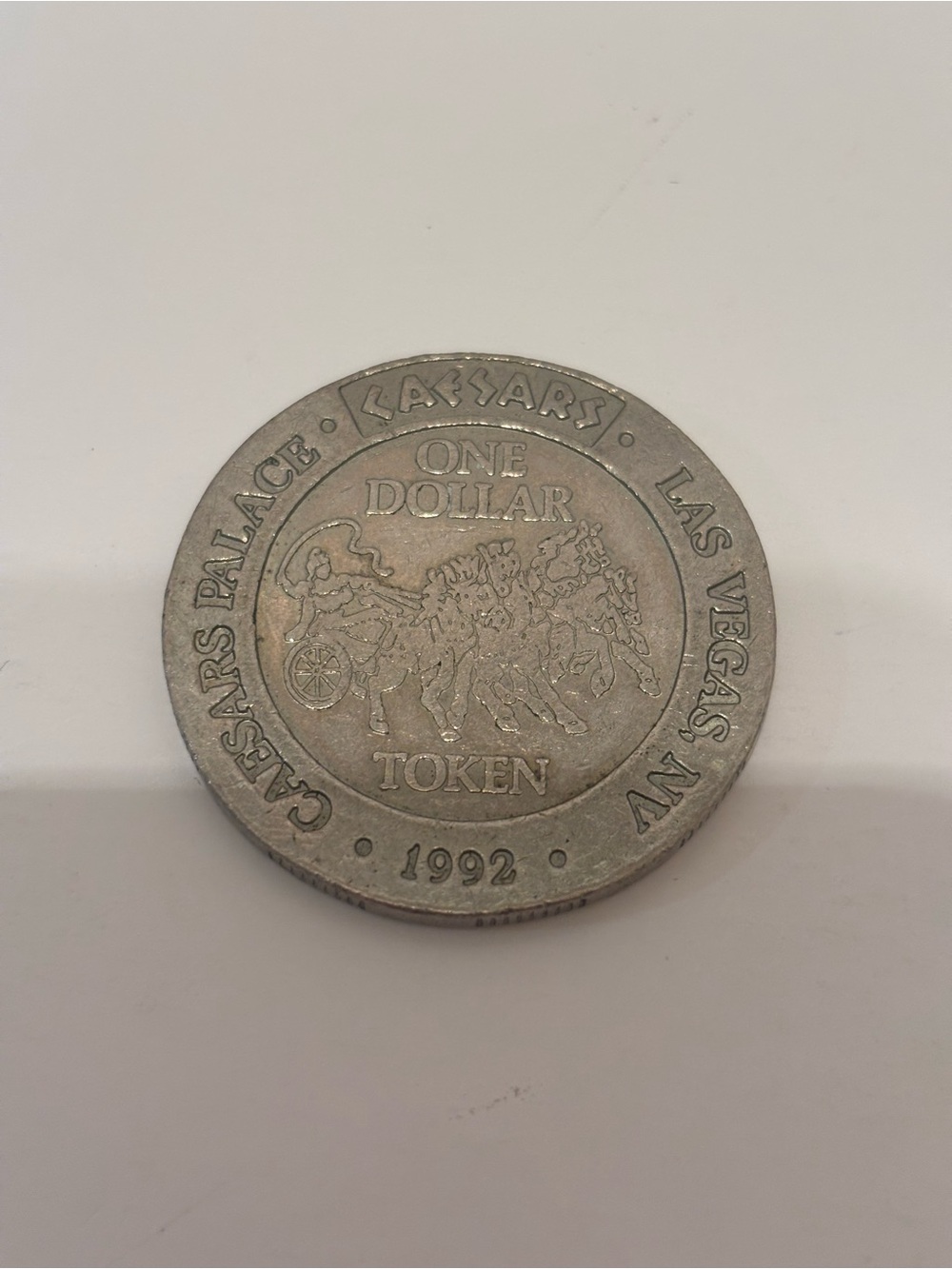 Caesars Palace One Dollar Token Wall Art - Silver Tone